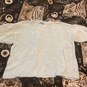 Baby blue sparkly top! Doesn’t say what size but I would consider it a large